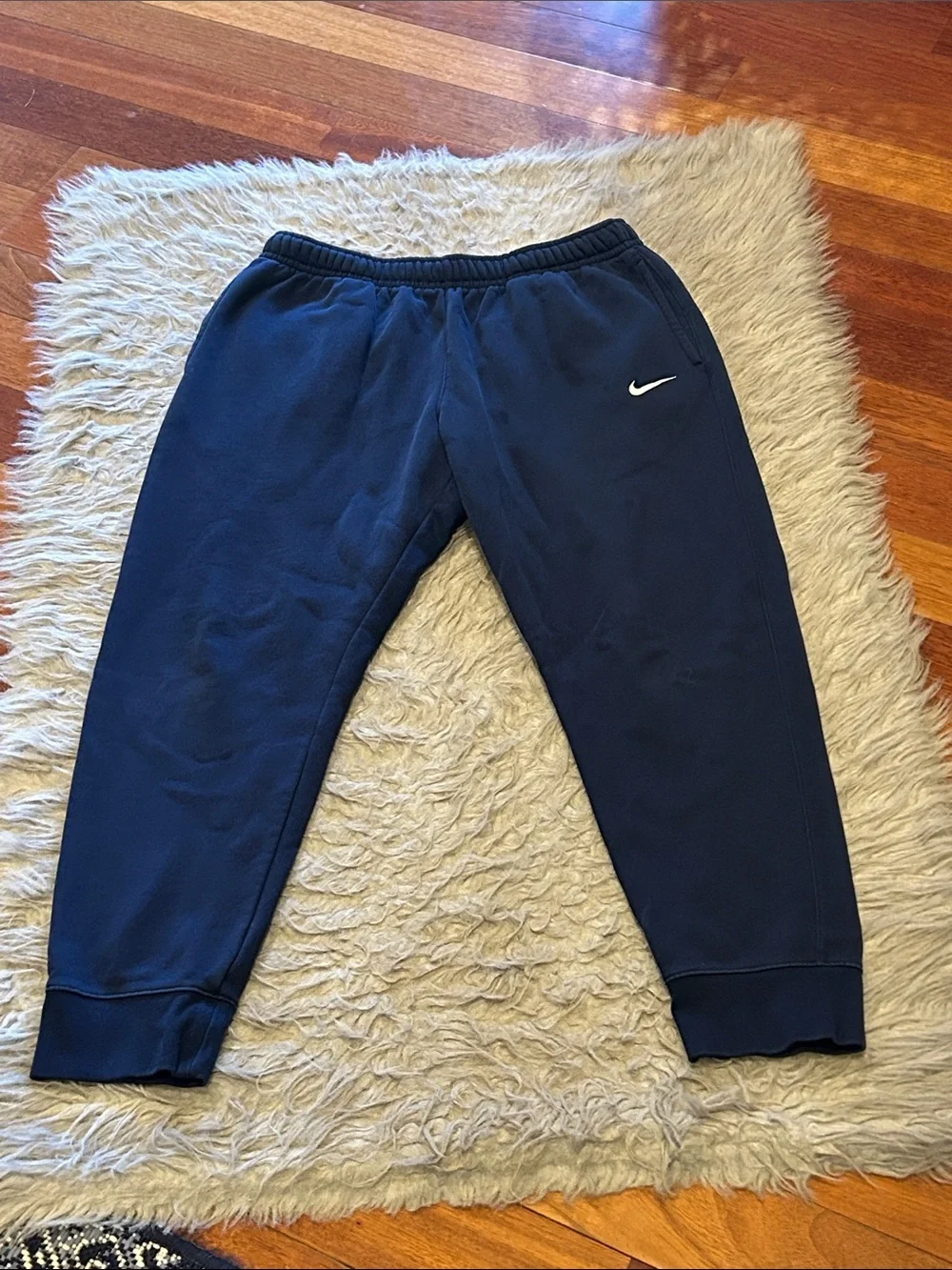 Nike Men’s Dark Blue Fleece Joggers with White Swoosh